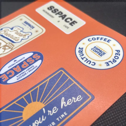 Matte rough laminate on a printed sticker sheet, with a soft textured finish.
